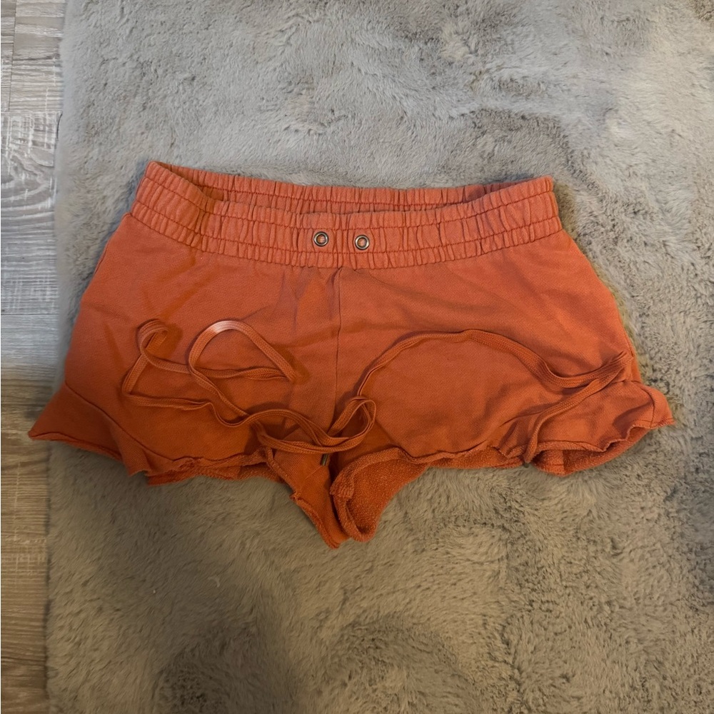 Aerie Orange Athletic Shorts with Ruffle Hem
